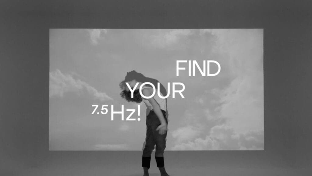 Black-and-white image of a person bending backward under a cloudy sky, overlaid with the text 'Find Your 7.5 Hz!' emphasizing self-discovery and mindfulness.